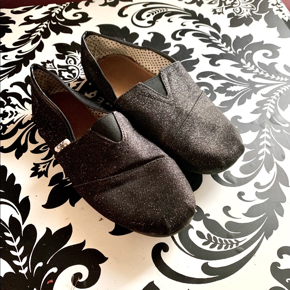 SOS BLACK GLITTER SLIP ONS